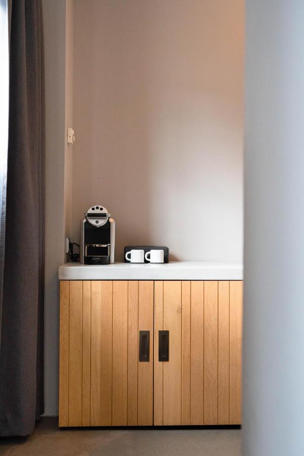 Het Arresthuis Roermond Exterior foto A Nespresso coffee machine in a hotel room